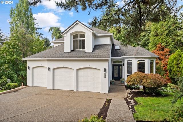 view of front of home with a garage