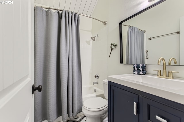 full bathroom with shower / bathtub combination with curtain, vanity, and toilet