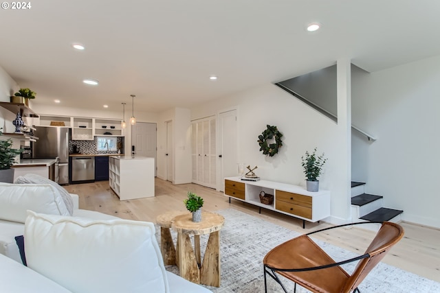 living room featuring light wood-type flooring