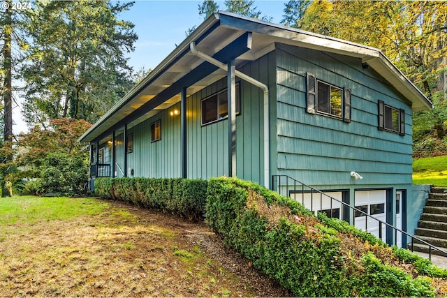 view of side of property featuring a garage