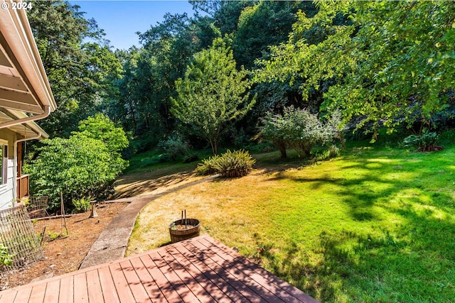 view of yard with a deck