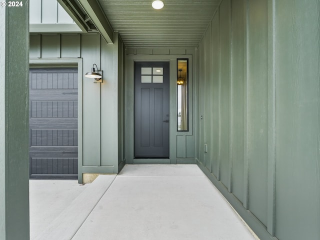 doorway to property with board and batten siding