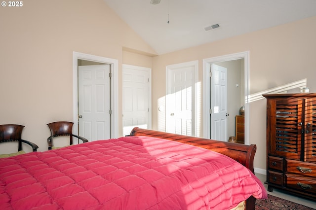 bedroom featuring vaulted ceiling