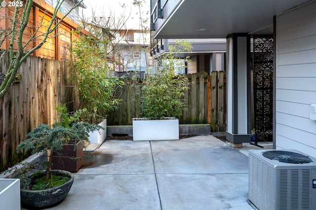 view of patio with central AC unit