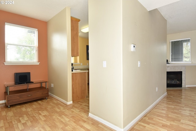 hallway with light wood-type flooring