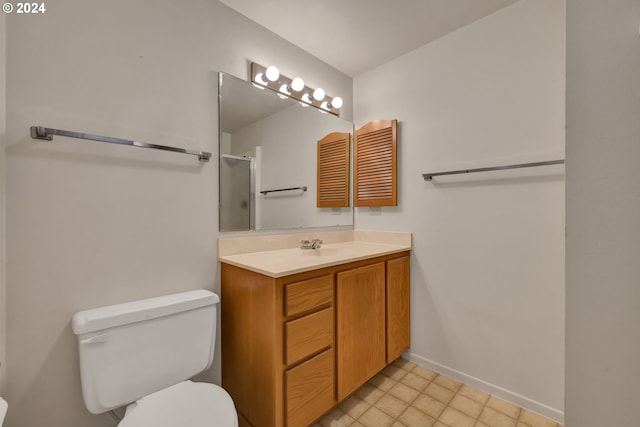 92932 Paschelke Rd, Marcola, OR 97454 - bathroom featuring toilet, a shower with door, baseboards, and vanity