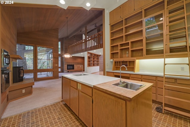 92932 Paschelke Rd, Marcola, OR 97454 - kitchen featuring a sink, open floor plan, black appliances, wooden ceiling, and light countertops