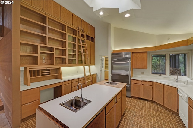 92932 Paschelke Rd, Marcola, OR 97454 - kitchen featuring a sink, a center island with sink, stainless steel built in refrigerator, vaulted ceiling, and light countertops
