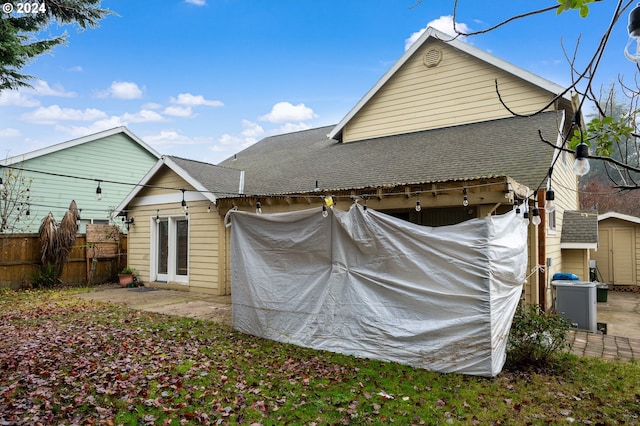 back of house with a patio area