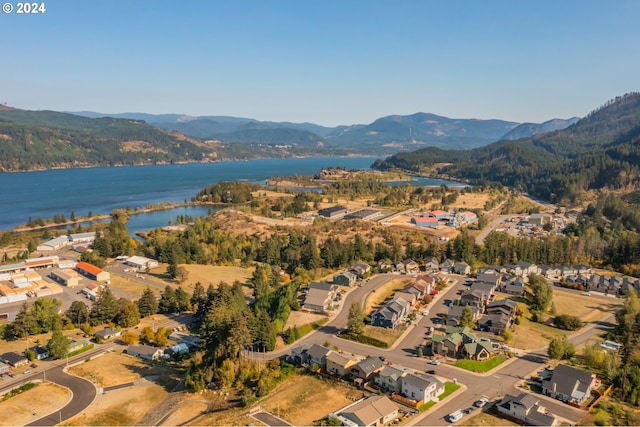 aerial view with a water and mountain view