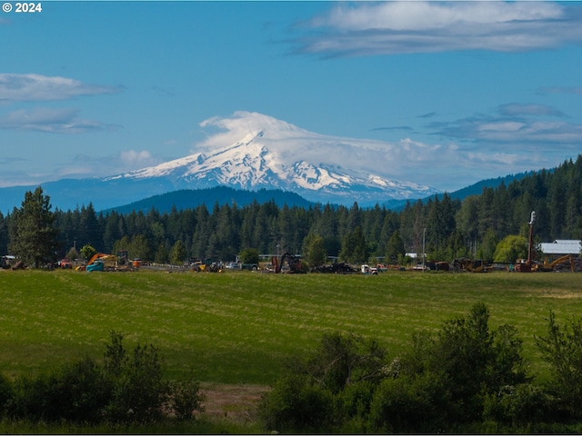 mountain view featuring a rural view and a wooded view