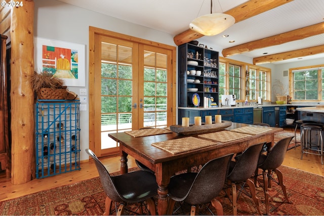 dining space featuring beam ceiling, recessed lighting, french doors, and light wood-style floors