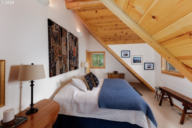 bedroom with wooden ceiling, lofted ceiling with beams, and carpet flooring