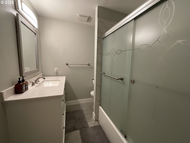 full bathroom with vanity, toilet, and shower / bath combination with glass door