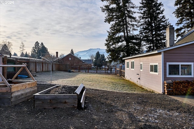 yard at dusk with a mountain view