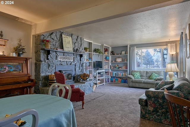 carpeted living room with a textured ceiling