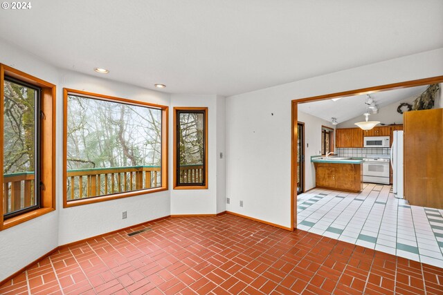 interior space with vaulted ceiling