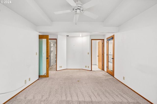 unfurnished room featuring light carpet and ceiling fan