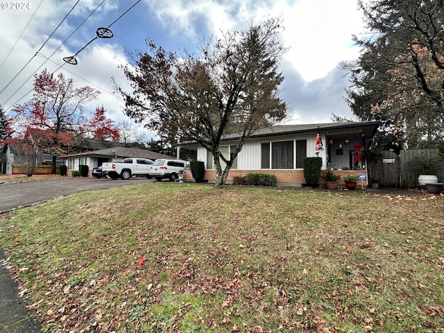 view of front of home with a front yard