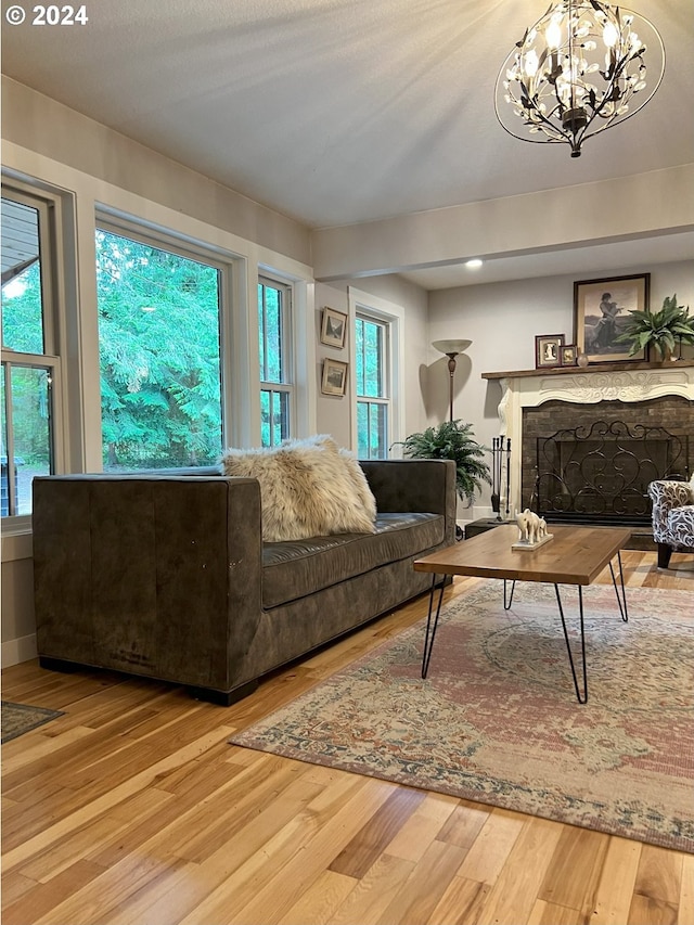 living room with a chandelier and hardwood / wood-style flooring