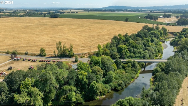 bird's eye view featuring a rural view and a water view