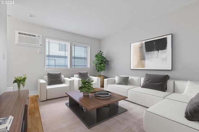 living room with an AC wall unit and hardwood / wood-style flooring