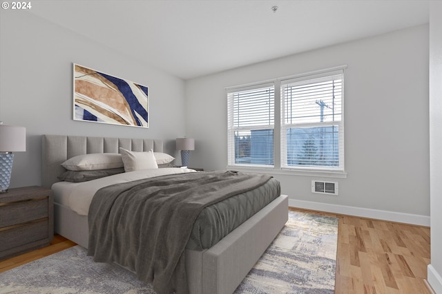 bedroom featuring light hardwood / wood-style floors