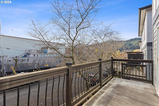 balcony featuring a mountain view