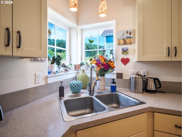 kitchen with sink and hanging light fixtures