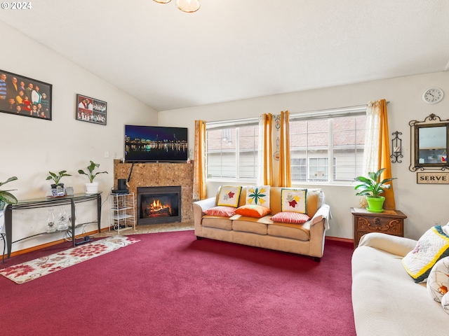 carpeted living room featuring lofted ceiling and plenty of natural light