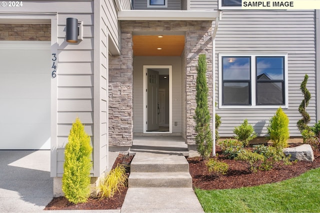 property entrance featuring a garage