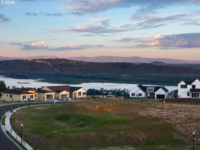 view of mountain feature featuring a water view