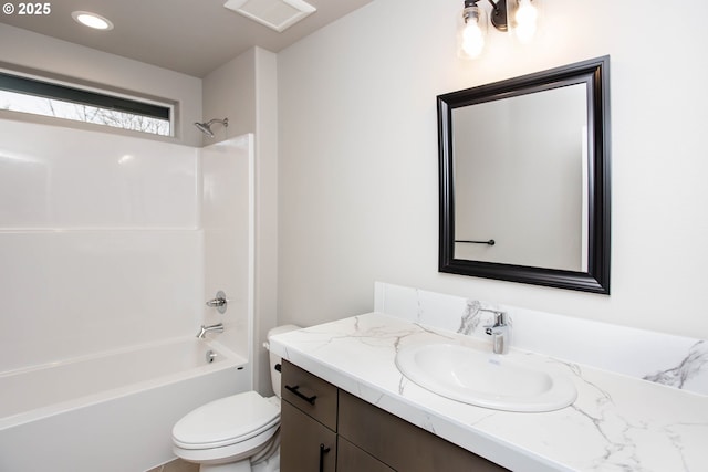 full bathroom with toilet, visible vents, shower / washtub combination, and vanity