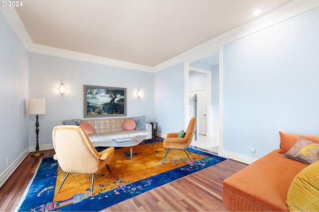 living room featuring dark hardwood / wood-style floors and crown molding