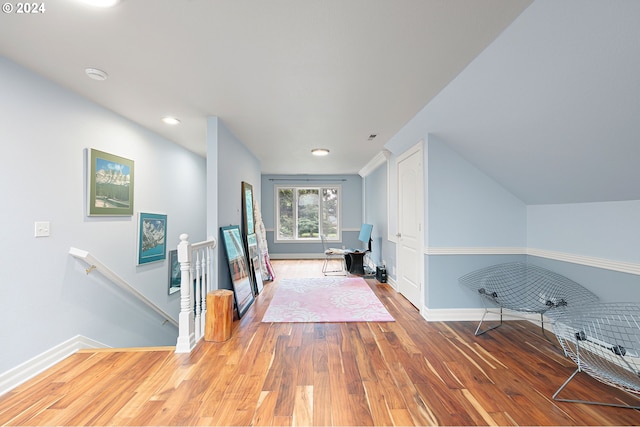 corridor featuring hardwood / wood-style floors