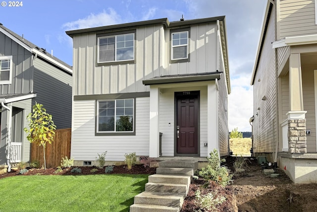 view of front facade with a front lawn