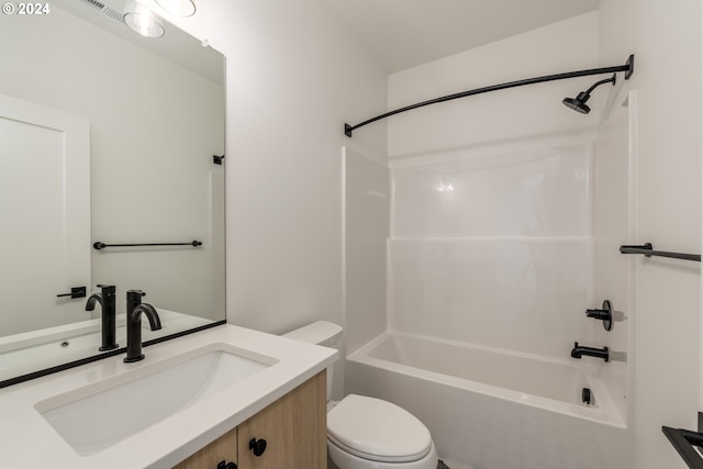 full bathroom featuring vanity, toilet, and washtub / shower combination