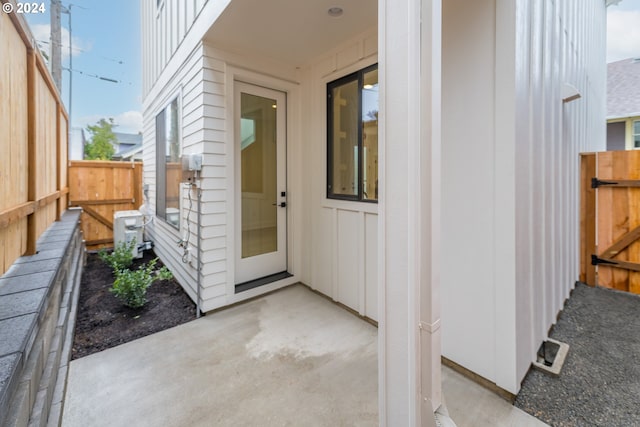 doorway to property with a patio area