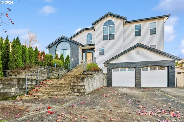 front of property with a garage