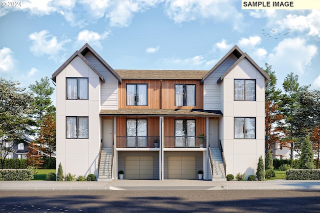 view of front of property with a garage