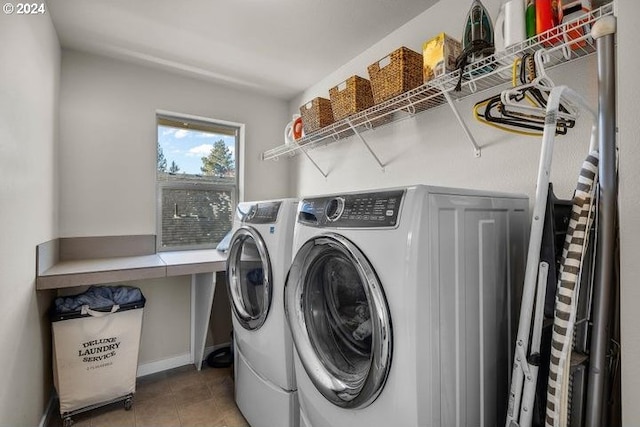 washroom featuring tile patterned floors and independent washer and dryer