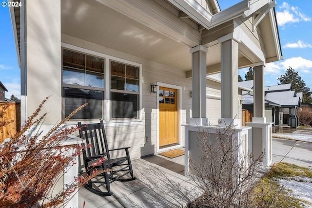 entrance to property with covered porch