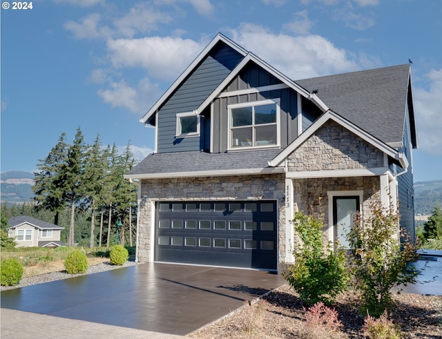 craftsman house with a garage