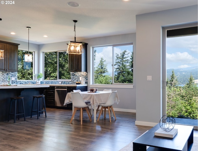 dining area with dark wood-type flooring