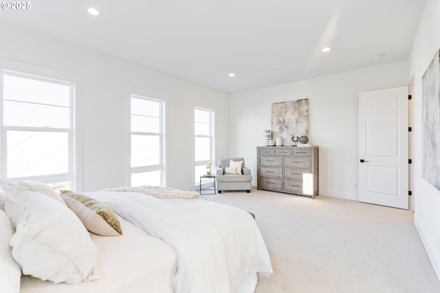 bedroom with light colored carpet