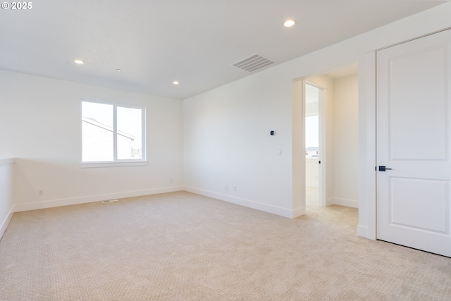 view of carpeted spare room