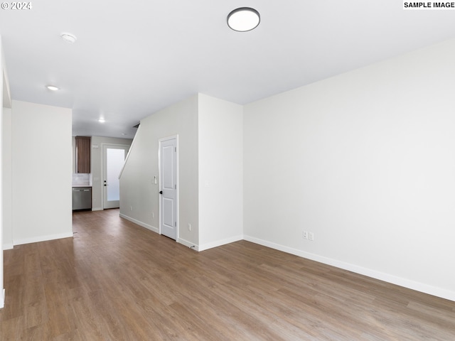 unfurnished room featuring wood-type flooring