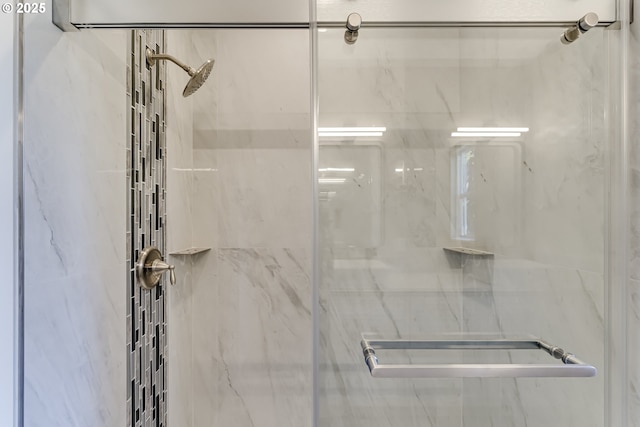 bathroom featuring an enclosed shower