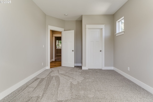 unfurnished bedroom featuring carpet floors