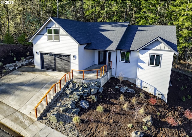 modern farmhouse style home with a garage